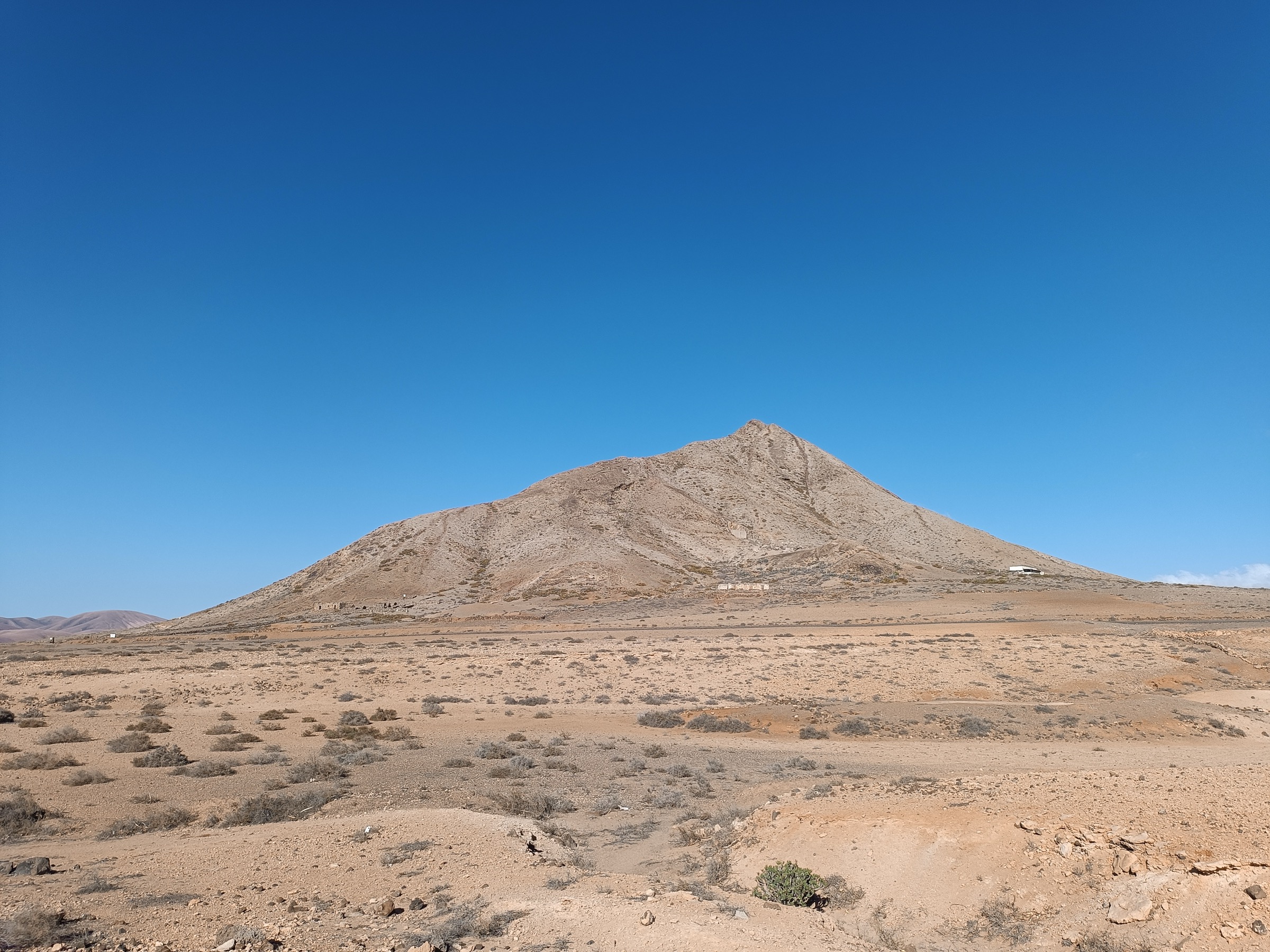 Montaña de Tindaya rising from the arid plain, a sacred mountain of the ancient Mahos